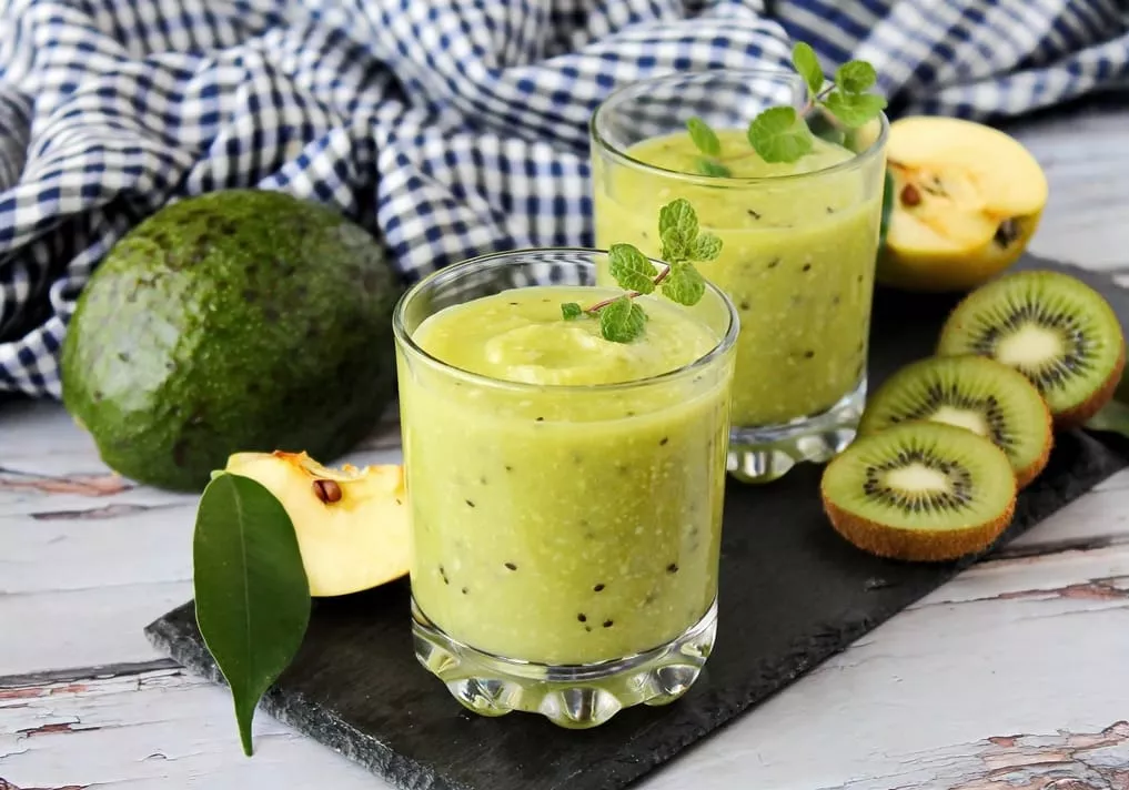 Avocado, kiwi and celery cocktail with apple juice