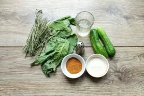 Prepare all the ingredients. Pour cucumbers with cold water and leave for 5-6 hours.