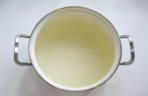 Pour any meat broth into the pot, I used chicken broth.