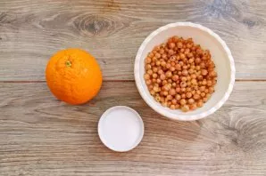 Rinse the orange thoroughly under hot water with a soft brush and dry.