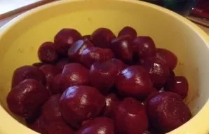 Boil the beets until tender, cool and peel.