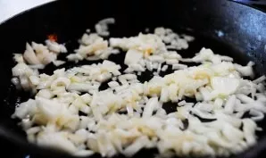 Preheat oven to 175 degrees. Grease a large baking sheet with oil. In a large pan, heat the butter. Add the onion chopped into cubes and ...