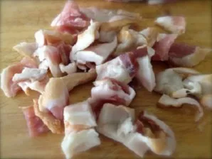 First you need to take a small piece of bacon and crush it. If you wish, you can use, for example, bacon. Put the bacon in a dry pan and ...