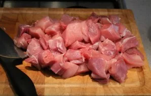 Cut the pork into cubes.