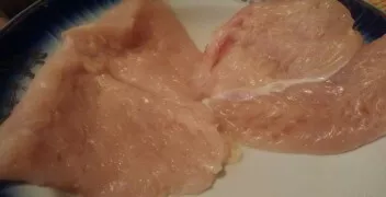 Chicken fillet  ideal meat for carbonades. Wash the fillet well and cut it into 2 parts. Knock out each part with a culinary hammer.