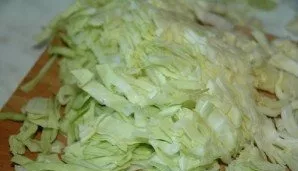 Wash and chop the cabbage.