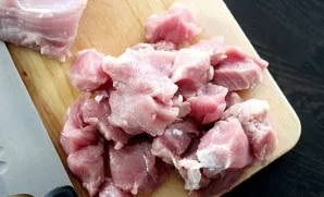 Cut beef or pork into small cubes.