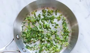 Heat olive oil in a pan, add onion letters and fry them for 3-5 minutes, remove the pan from the heat and add chopped parsley.