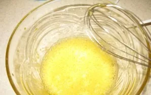 Beat the egg with a fork or whisk.