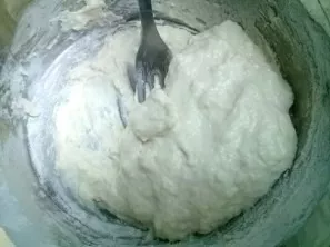 Make the puffed dough. Pour 1 cup of very hot water (almost boiling water) into 1 cup of flour, mix well.