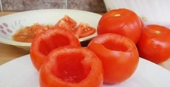 Rinse the tomatoes thoroughly, cut off the lid (use a sharp knife for this). Carefully remove the pulp with a teaspoon so that the tomato...