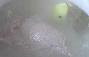 Wash the pork and add three liters of water. Bring to a boil, scrape off the foam. Add peeled onion (with slagged cloves) and bay leaf to...