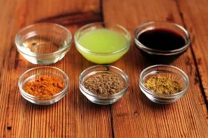 First you need to mix vegetable oil with lemon (or lime) juice and soy sauce. Add coriander, cumin and turmeric. Mix everything thoroughl...