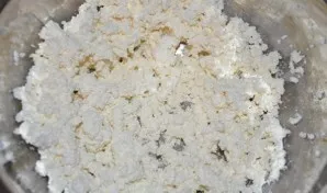 Rub the cottage cheese through a sieve and put in a deep bowl. Carefully separate the whites from the yolks and add the latter to the cot...