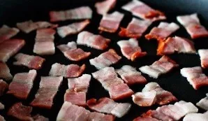 Chop the bacon and fry in a pan.