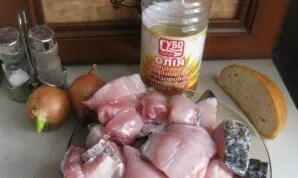 First of all, the bread should be poured with water and put to soak. We gut the fish, remove the head and tail, scrape off the scales and...