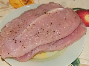 First you need to cut the fillet in half lengthwise, after which the meat should be knocked out with a culinary hammer. Salt and season t...