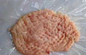 Wash the chicken fillet, dry it and cut it lightly. It is important not to damage it, otherwise the roll will not be homogeneous. It is b...