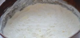 Crush cold butter, flour and sugar by hand into crumbs. Separate two-thirds of the mass and put in a baking dish. Squeeze everything with...