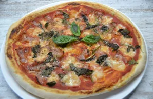 Bake the pizza at a temperature of 200 degrees for about 20 minutes. It will be very tasty pizza, real Italian pizza.