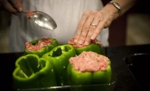 Put the peppers in a baking dish and fill it tightly with minced meat. Bake at a temperature of 280 degrees for 40-60 minutes until the m...