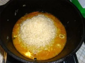 Rinse the rice thoroughly under running water to sift all the starch from it. In order to be guaranteed to get a pilaf, and not porridge,...