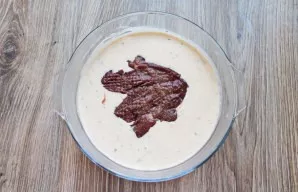 Pour vegetable oil into the pan and heat it on medium heat. Dip the liver in the batter so that the liver is completely covered with the ...