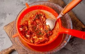 Rub it with a spoon or spatula.