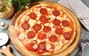 Pepperoni and mozzarella pizza is ready. Bon Appetit!