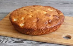 Transfer the prepared charlotte to a board or to a container. Cool slightly and serve. If desired, sprinkle with icing sugar.