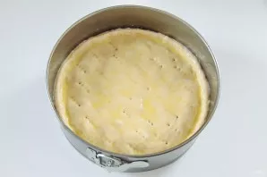 Roll out the second part of the dough and cover the filling with it. Pinch the edges and shake the top with a fork so that steam comes ou...