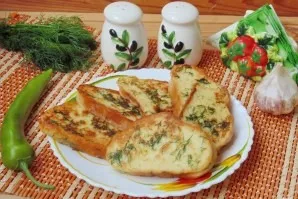 Rub the still hot toast with garlic. Although this is not necessary. -