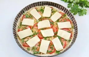 Put the remaining cheese on top of the tomatoes.