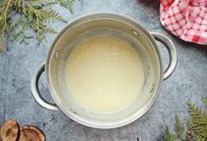 Add soft butter to the mixture and beat until smooth and fluffy.