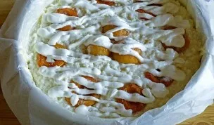 Brush the top with sour cream.