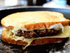 Fry the sandwich on both sides until the bread is golden in color.