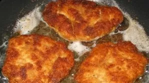 Fry over high heat in well-heated oil for 2-3 minutes on each side, and then simmer under the lid for 10 minutes over low heat.