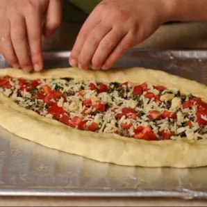 Fold in the shape of a boat.