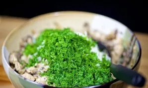 Then add finely chopped dill to the filling.