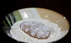 Before cooking, roll the zrazs on all sides in flour.