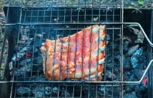 Fry the ribs on both sides while applying the sauce. This will take about 15 minutes. Remove from heat, slice and serve immediately.