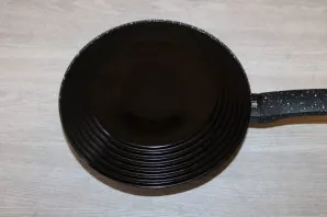 Cover the pan with a large container.