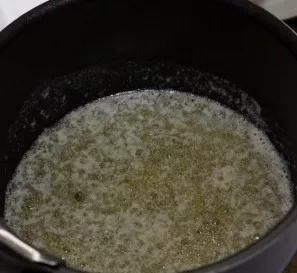 Now it's time to make the bechamel sauce. Put the butter in a pot, put it on medium heat, melt the butter.