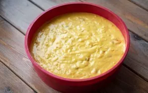 Put the fully prepared dough in a baking dish. I have a silicone mold, so I didnt smear it with anything and did not smear it with baking...