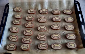 Cut the cooled dough into slices about 1 cm thick. Place in a baking tray, bake cookies at 180-20 degrees for 15-20 minutes.