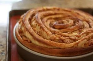 The finished cake will rise a little and may not have a perfectly smooth top.