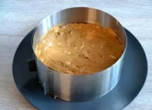 Add half the cream, smooth it out.