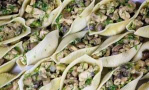 Fill each shell with stuffing and place in a deep baking sheet or baking dish.