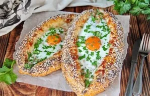 Return the Khachapuri back to the oven and fry until the protein swells. When serving, if desired, put a piece of butter in each boat and...