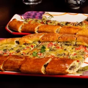 Cut into pieces and serve. Bon Appetit!